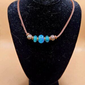 Teal Lampwork, Copper and Raku Ceramic Beads on a Rawhide Cord